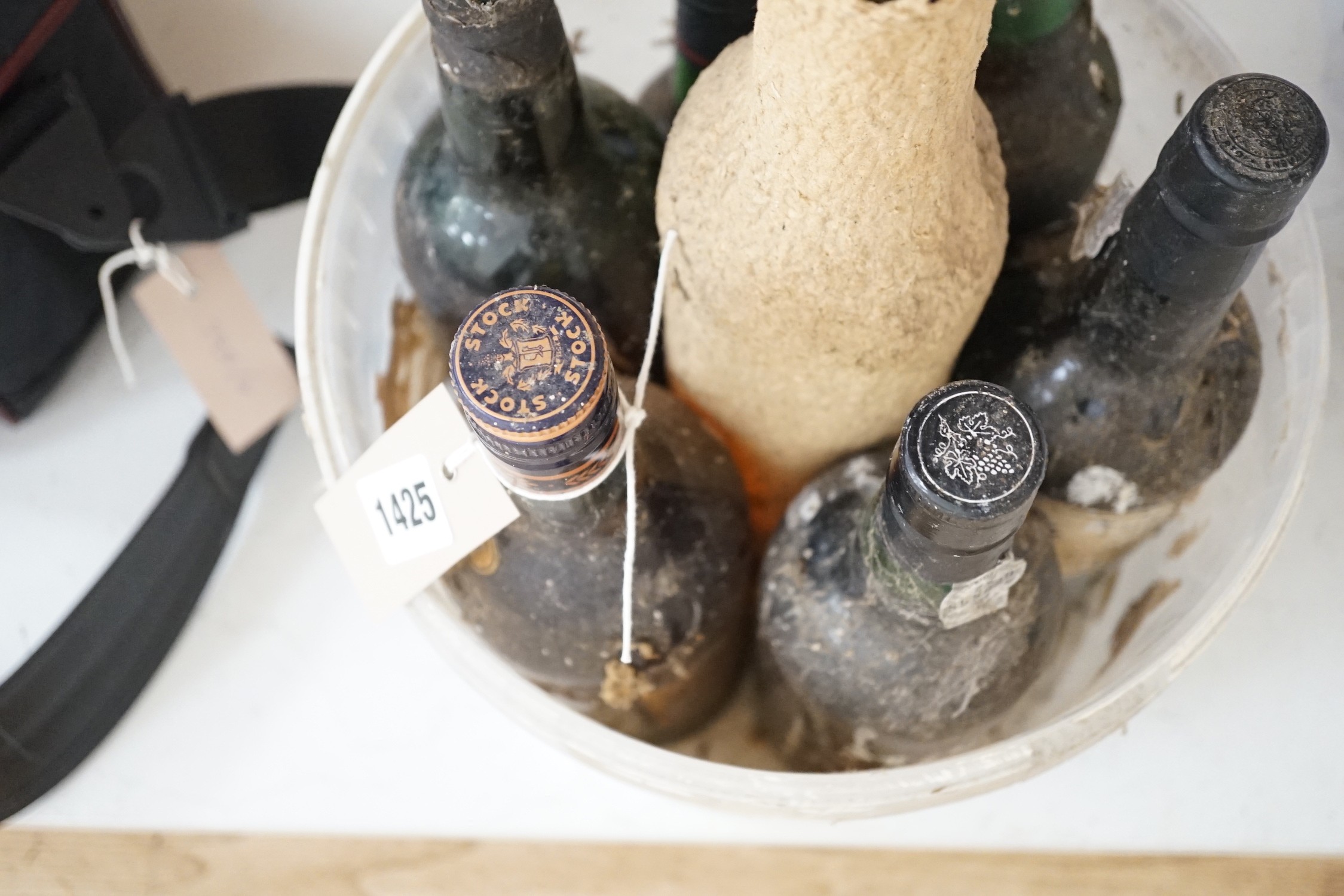 Seven mixed bottles of brandy and port